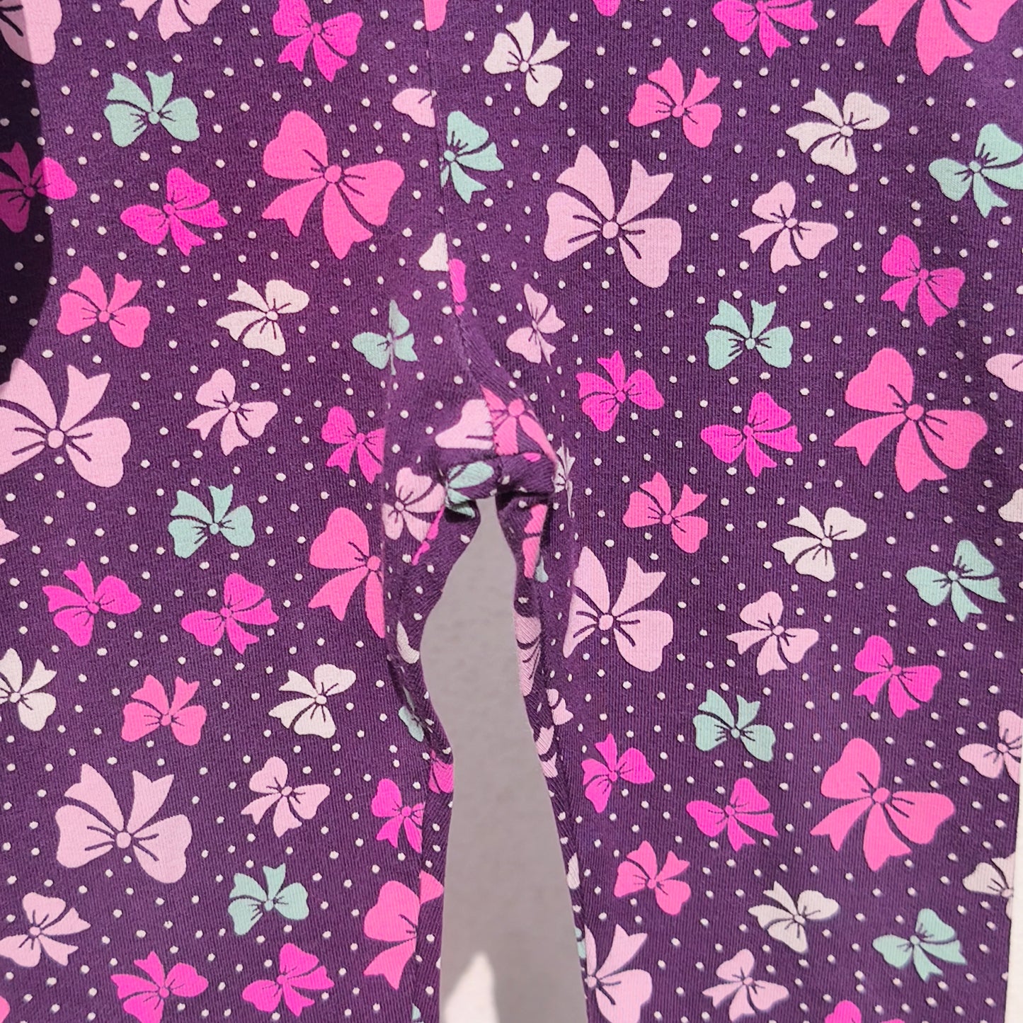 Leggings H&M Roxas com Padrão de Laços Coloridos – (Ajustar Tamanho)